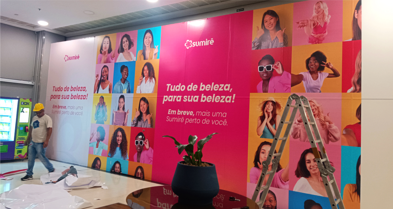 realcom_servicos_adesivacao_tapume_shopping_sumire
