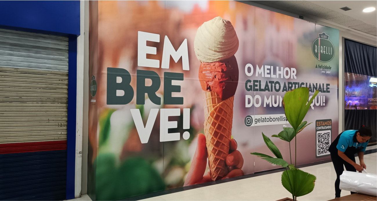realcom_servicos_adesivacao_tapume_shopping_embreve